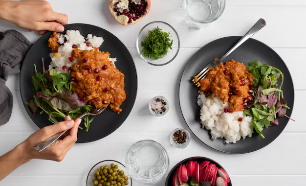 A diverse spread of dishes illustrating perfect food pairings, including wine, herbs, and spices.