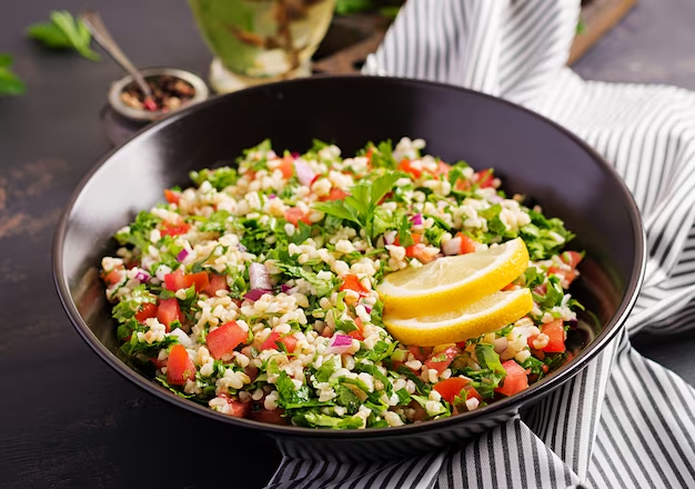 Mediterranean quinoa salad with cucumbers, tomatoes, and olives